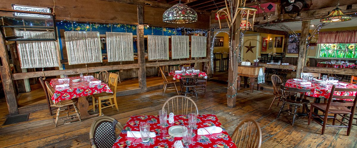 italian farmhouse dining room with tables in rustic barn style setting different angle