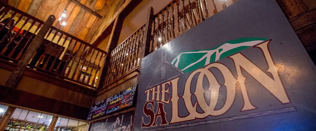 cman lincoln the saloon sign under balcony