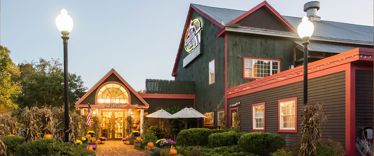 common man inn & spa exterior walkway with pumpkins up path